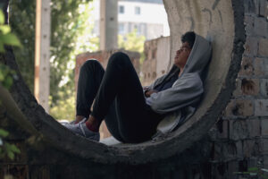 Teen boy hides in tunnel as he shows signs of teen depression